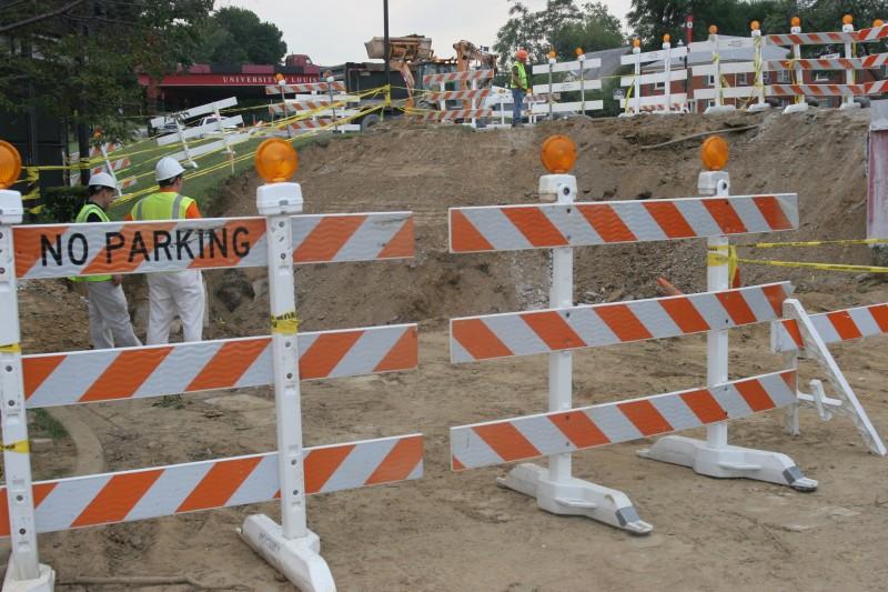 Orange Striped barricades near the water main broken