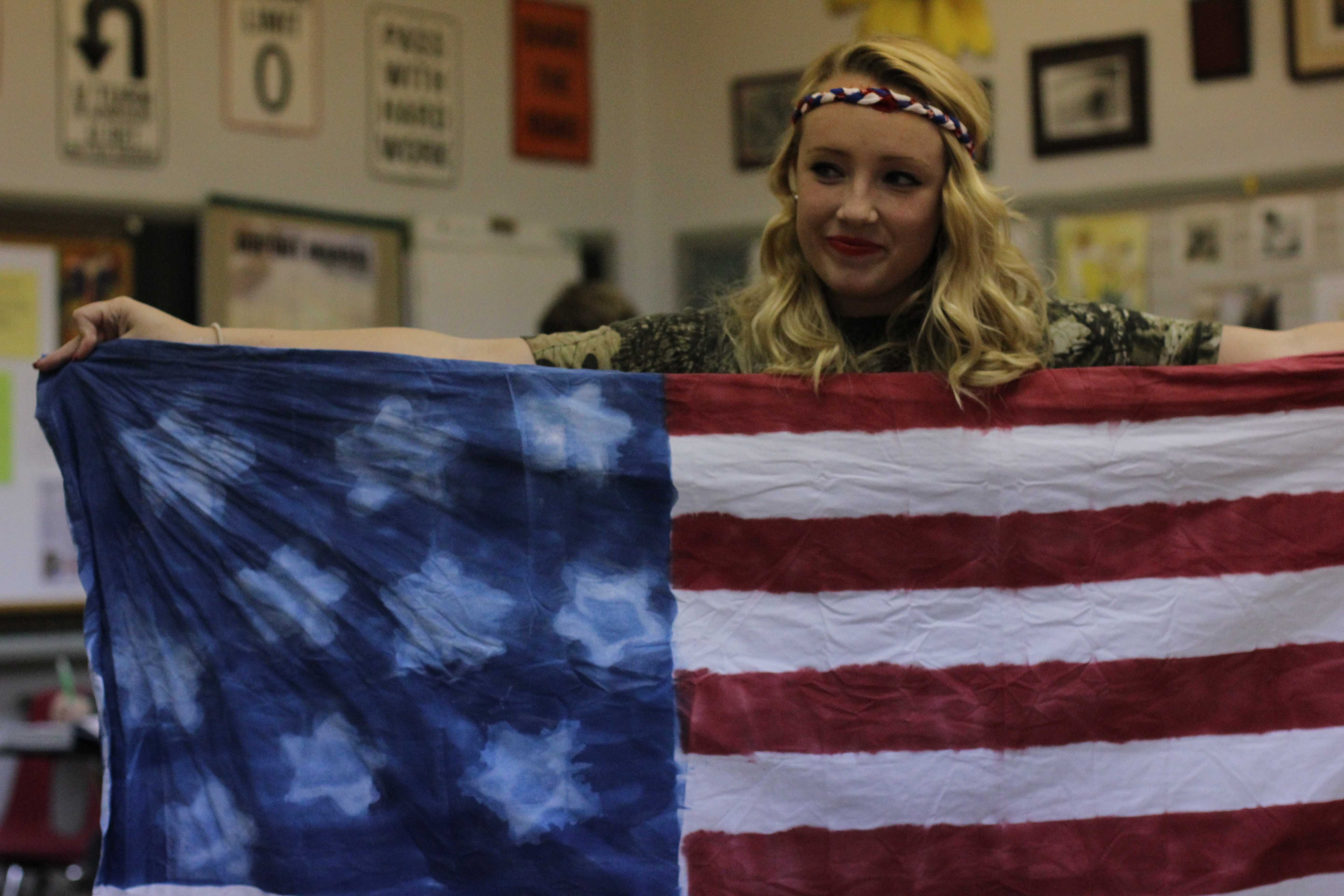 Allie Thrailkil, (11) shows her homemade American flag. Photo by Samantha Klein
