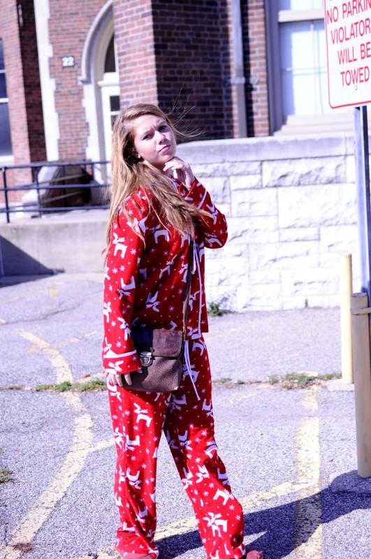 Kinsey Ball (11) strikes a pose at lunch sporting her Christmas-themed pajamas. Photo by: Jack Steele Mattingly