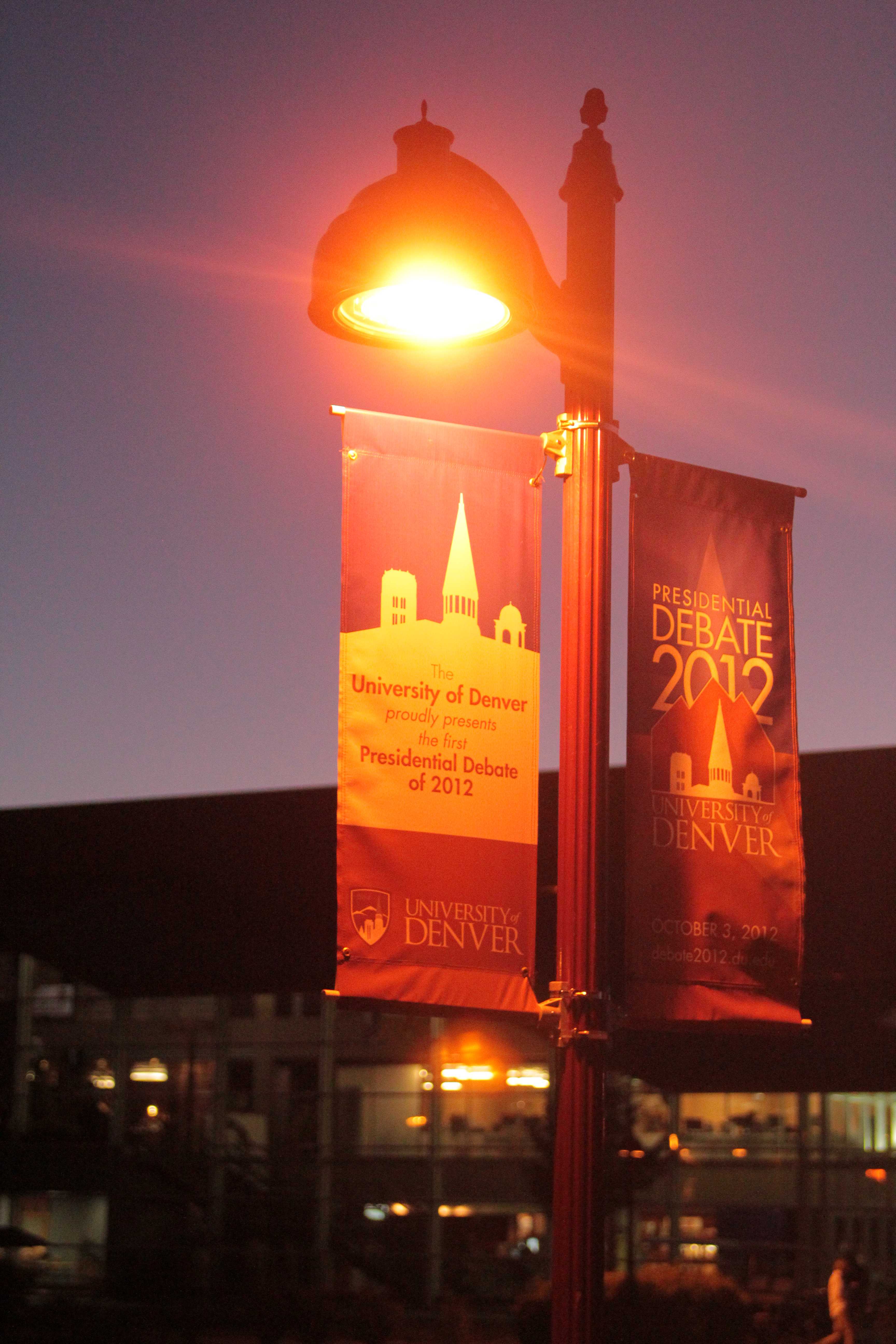 Banners announcing the debate hang from lampposts around the University of Denvers campus.
