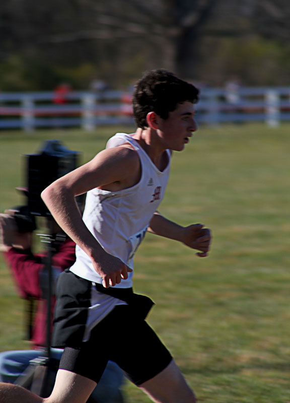 Reed Mckinley  (11) eyes the finish line.