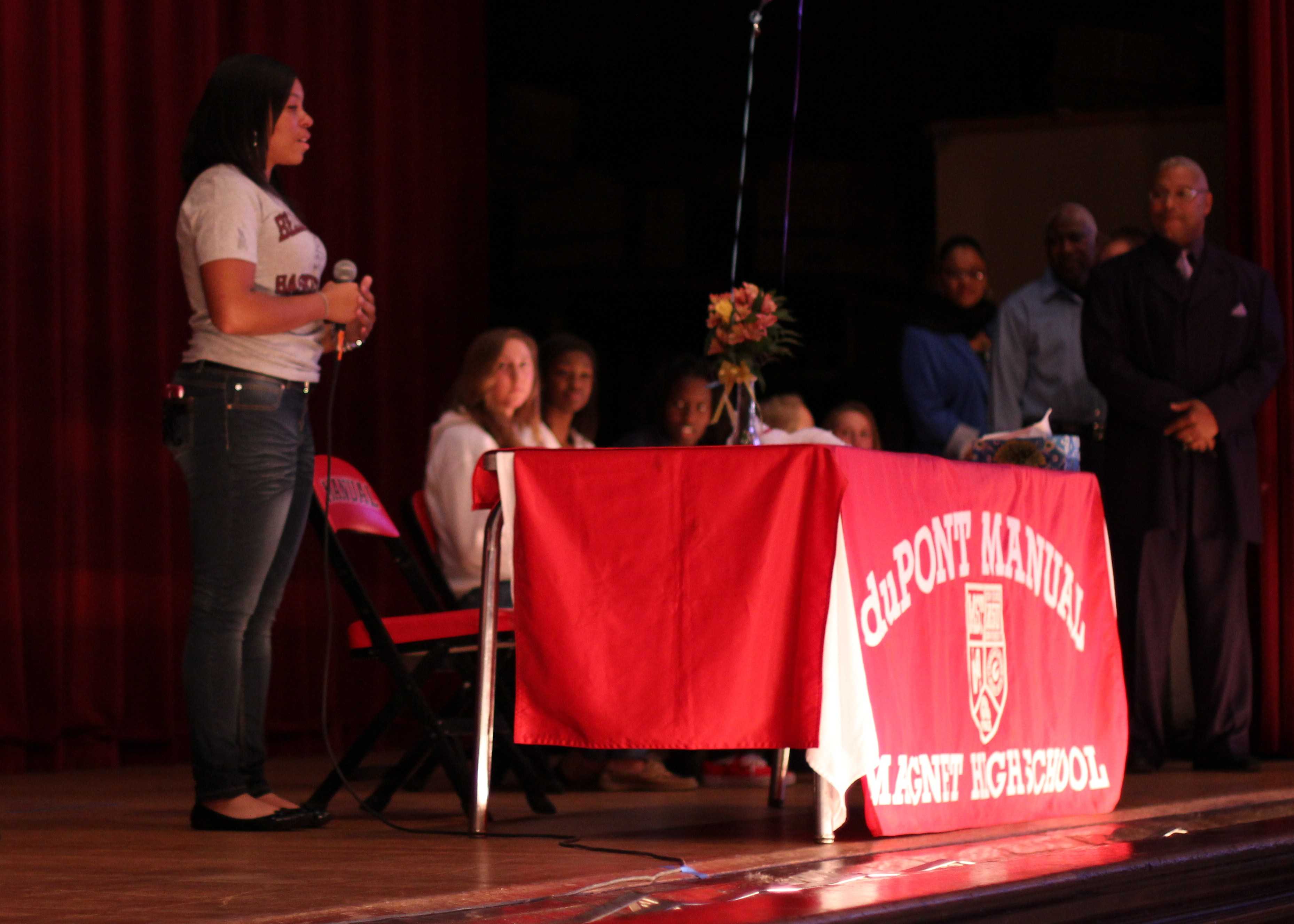 Destony Curry, (12) makes a speech after signing her letter of intent to play basketball at Bellarmine University.