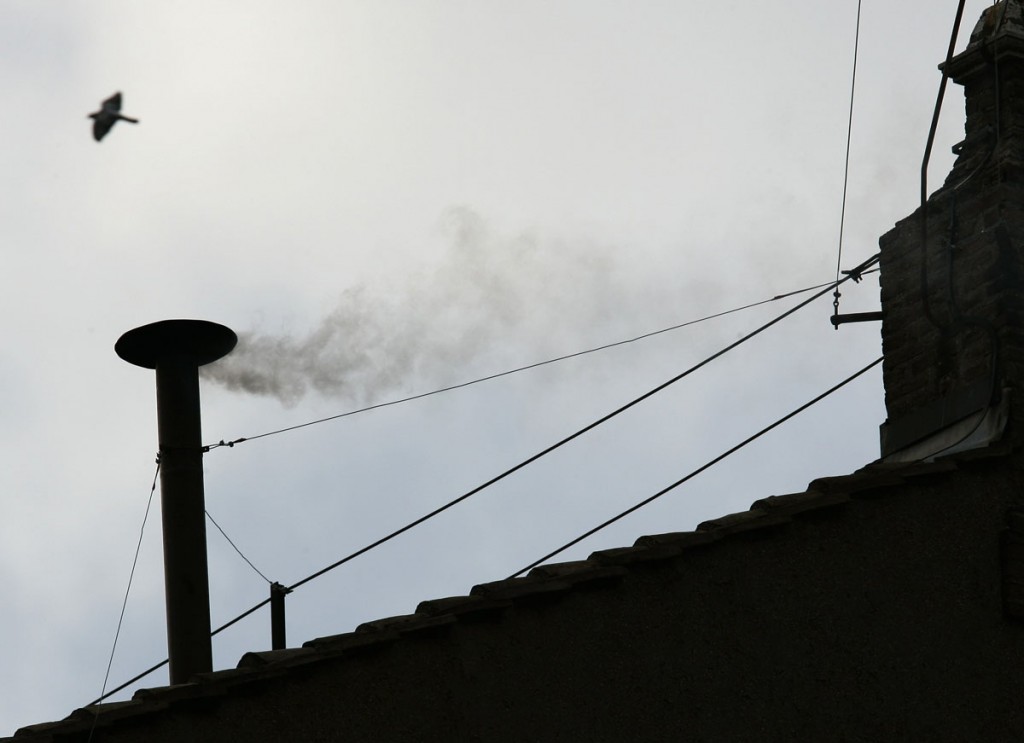 File picture shows white smoke rising from the chimney above the Sistine Chapel in the Vatican indicating the election of  German Cardinal Ratzinger as Pope Benedict XVI