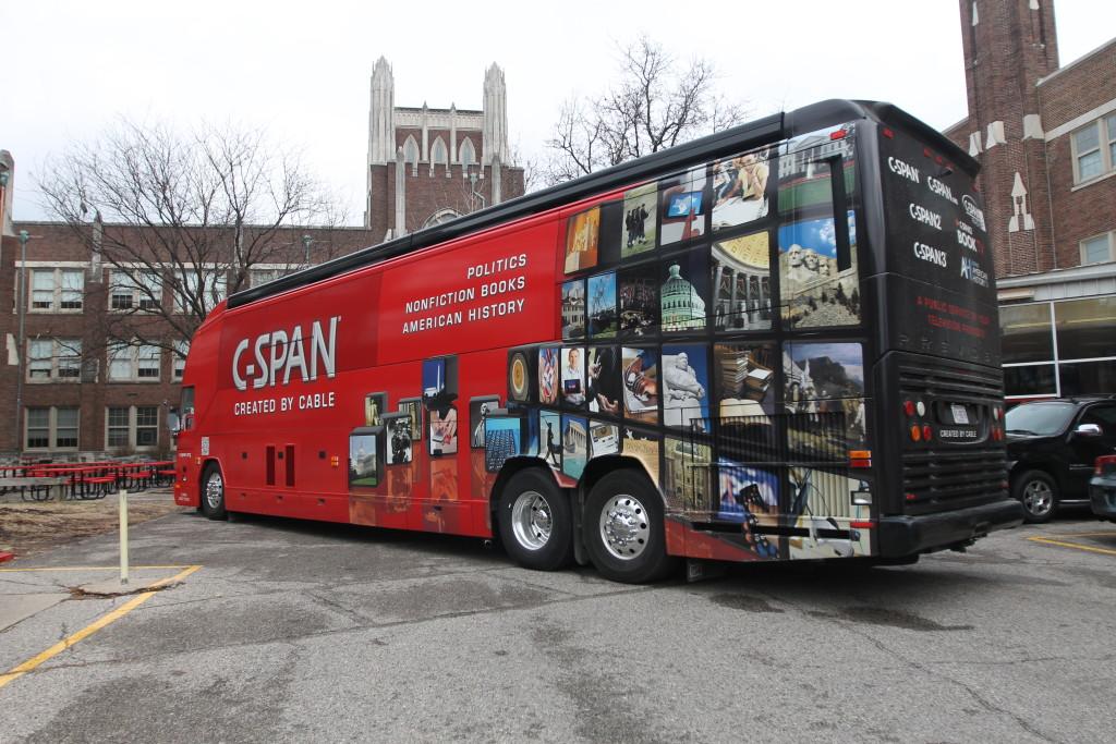 The+C-SPAN+portable+bus+squeezed+into+the+courtyard+parking+lot.+