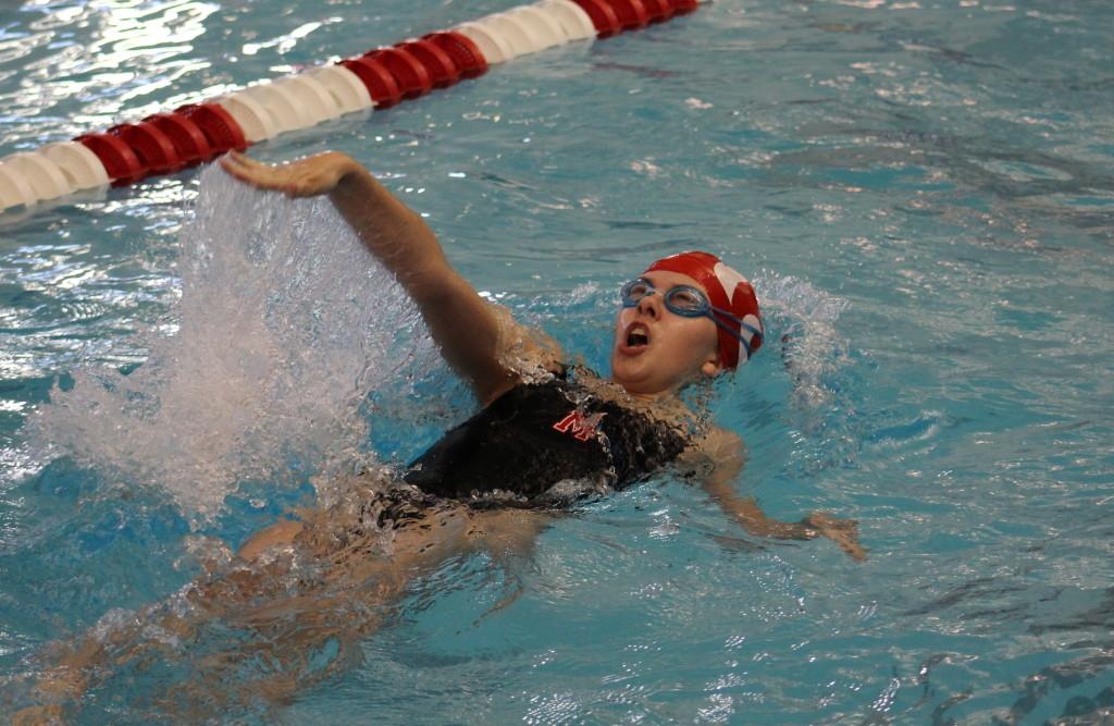 Sophia+Korner+swims+in+heat+eight+of+event+11%2C+the+girls%E2%80%99+50+yard+backstroke.+She+finished+with+a+time+of+41.80+seconds+to+place+twenty-sixth.+Photo+by+Kate+Hatter