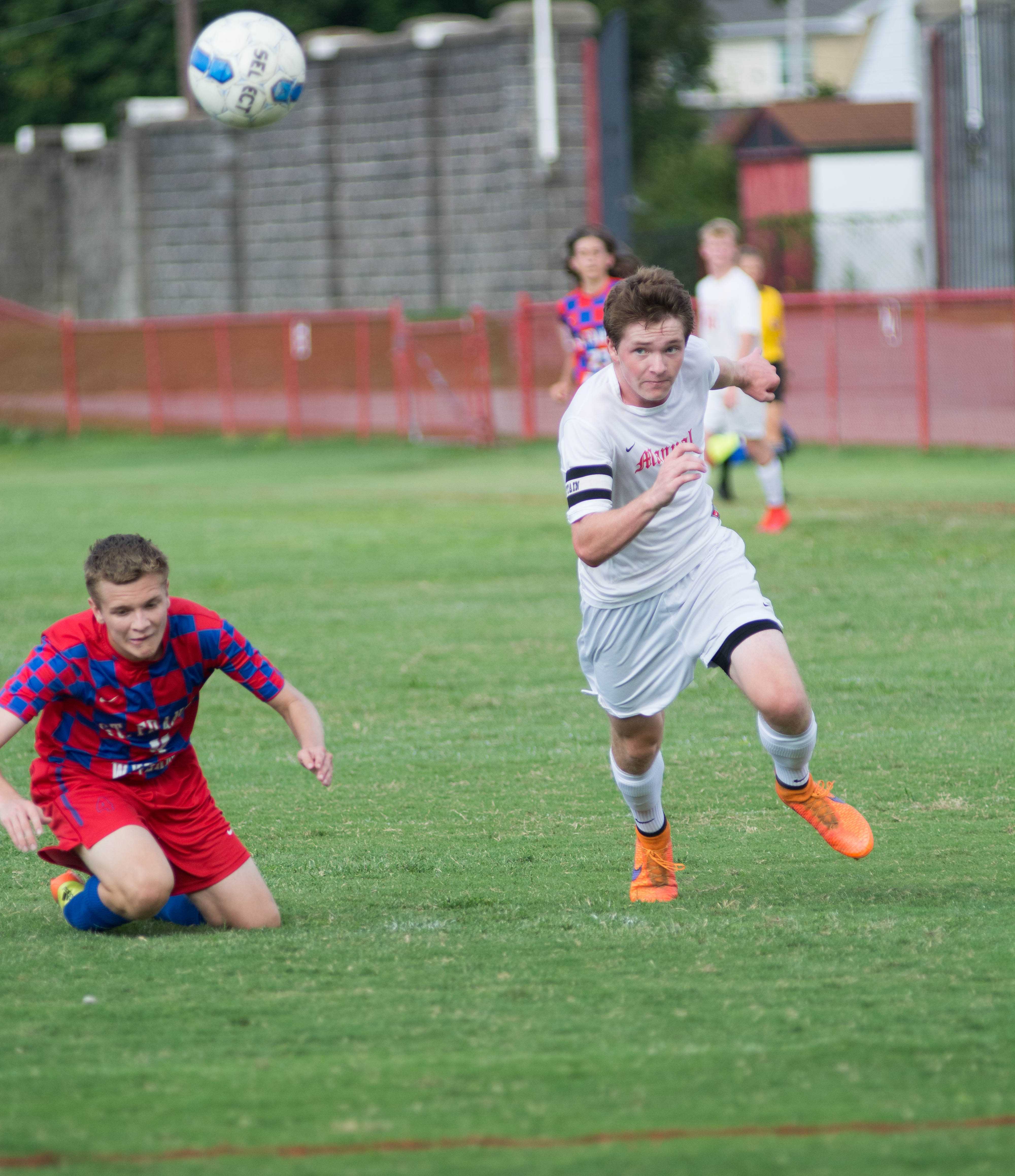 Dylan Barth (11,#9) rushes to the ball on a goal scoring opportunity.
Photo by Luke Smith