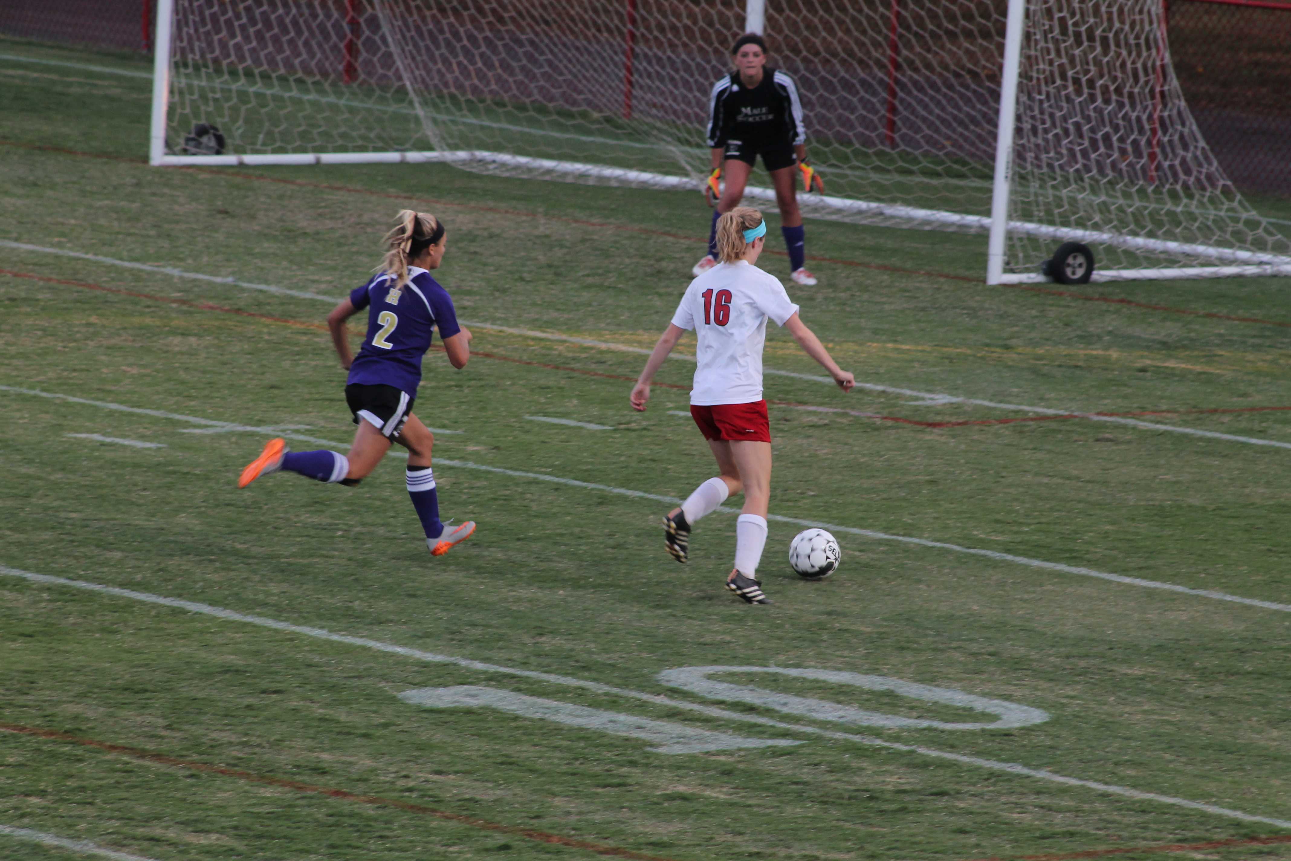 Madilyn Hord (11, #16) takes an open shot on goal. Photo by Shea Dobson  