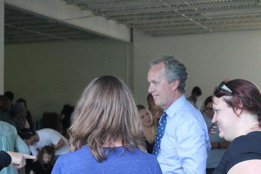 Mayor Fischer interacts with community members. He later tweeted that this event proves that love always wins. Photo by Kaylee Arnett.