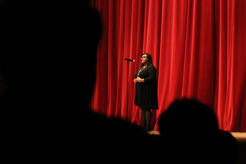One performer reads a poem, reflecting on black history. Photo by Haeli Spears.