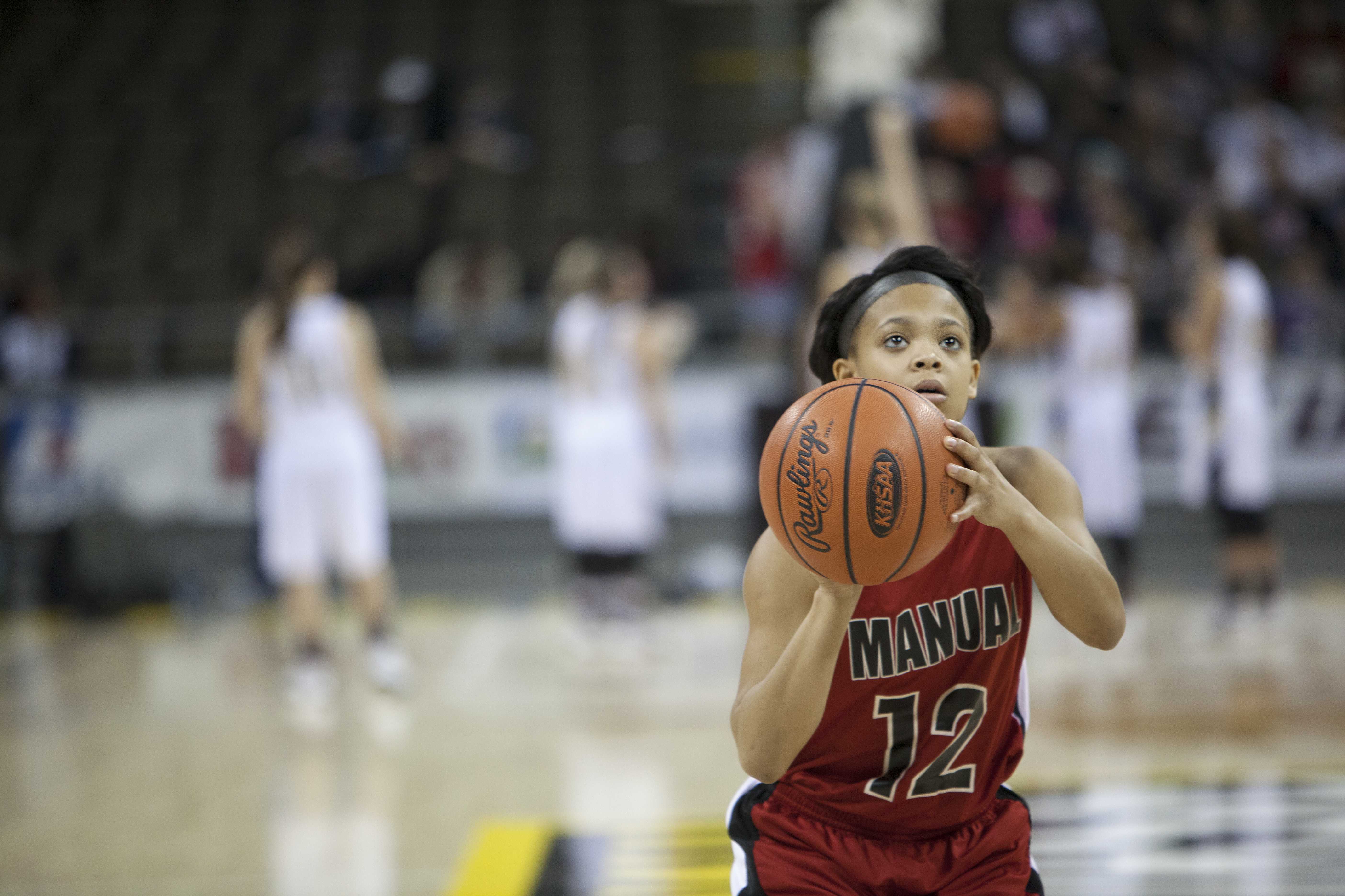 Tyonne Howard (10, #12) shoots a free throw. Photo by Piper Cassetto.