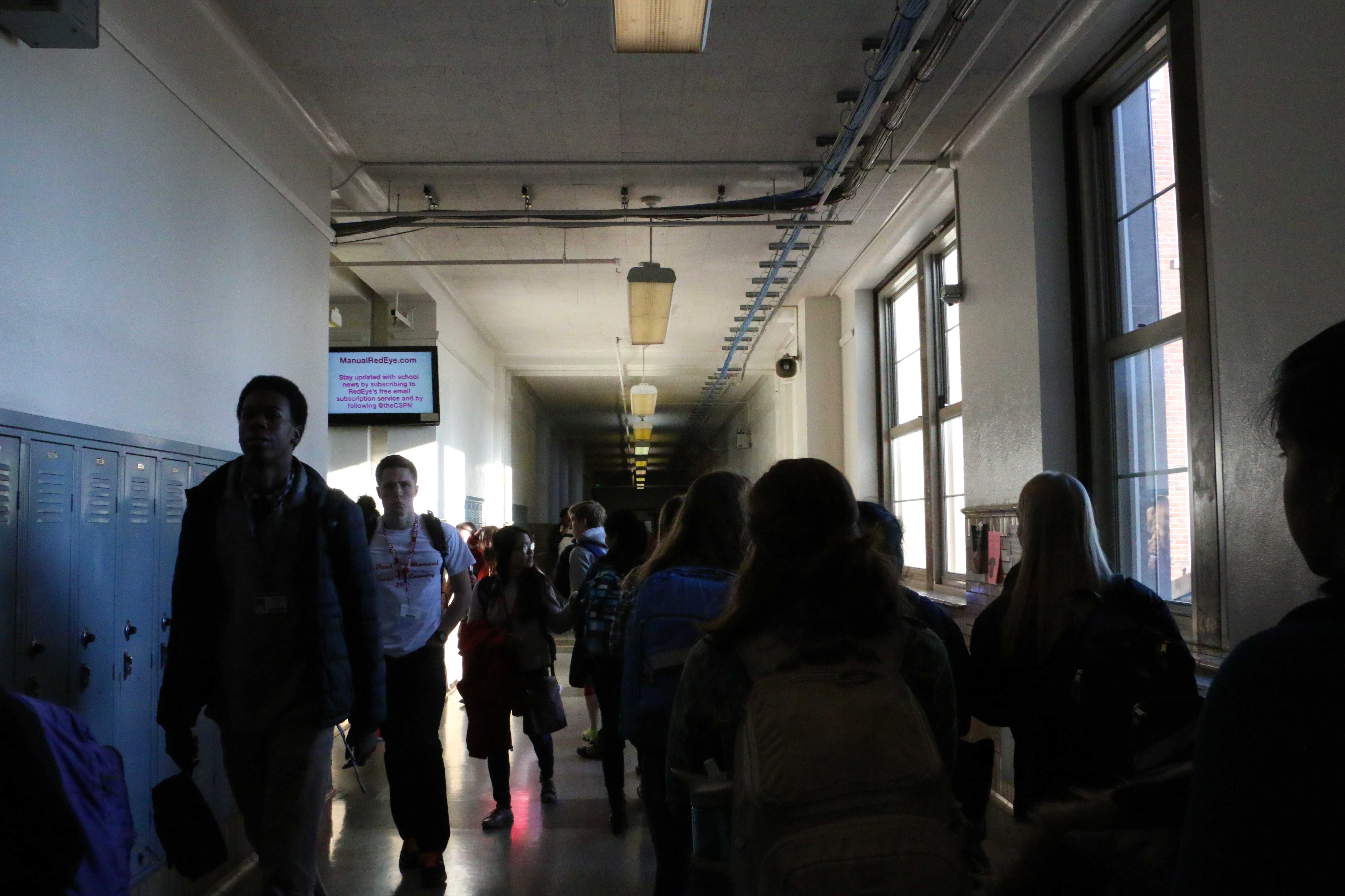 Current Manual students walk the halls as incoming freshmen prepare for next year. Photo by Fons Cervera.