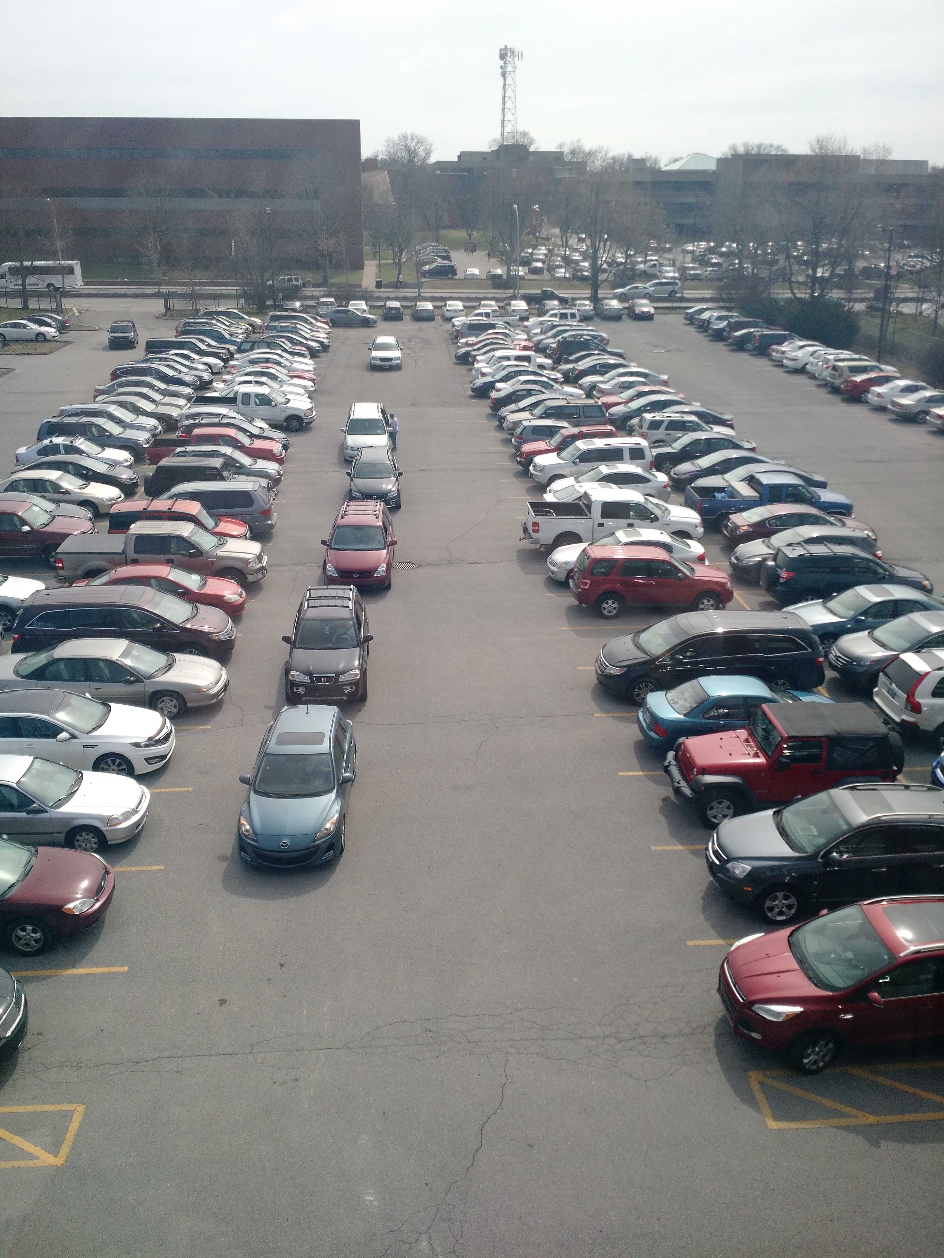 Manuals always full parking lot that seniors are taking advantage of the low gas prices. Photo by author.