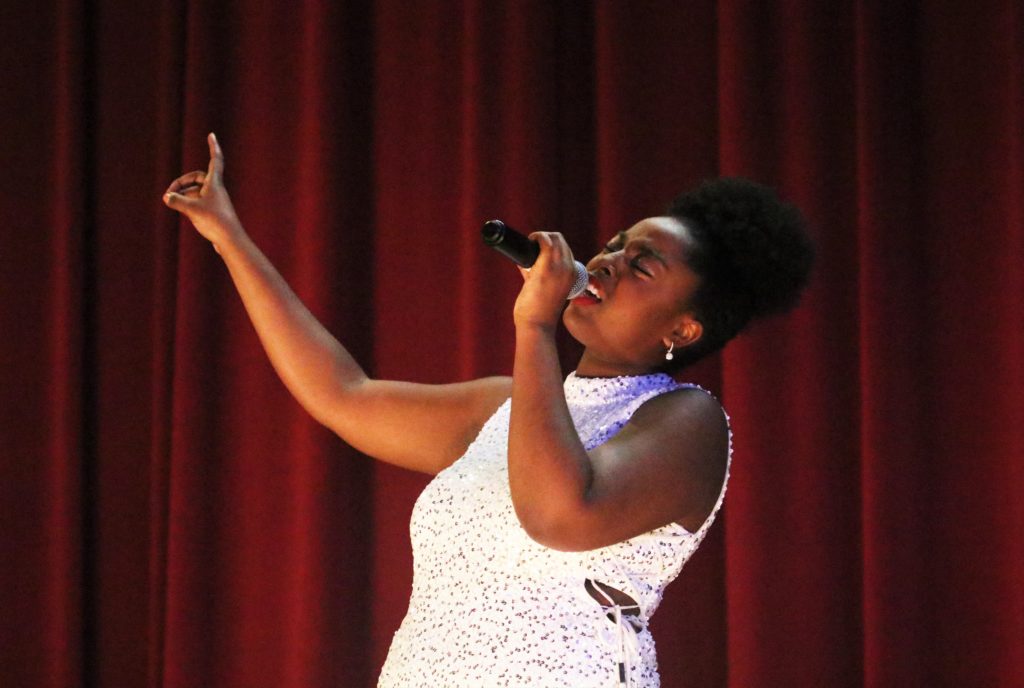 Eve Williams (YPAS, 12) hits a high note while performing I Believe. Photo by Grace Bradley.