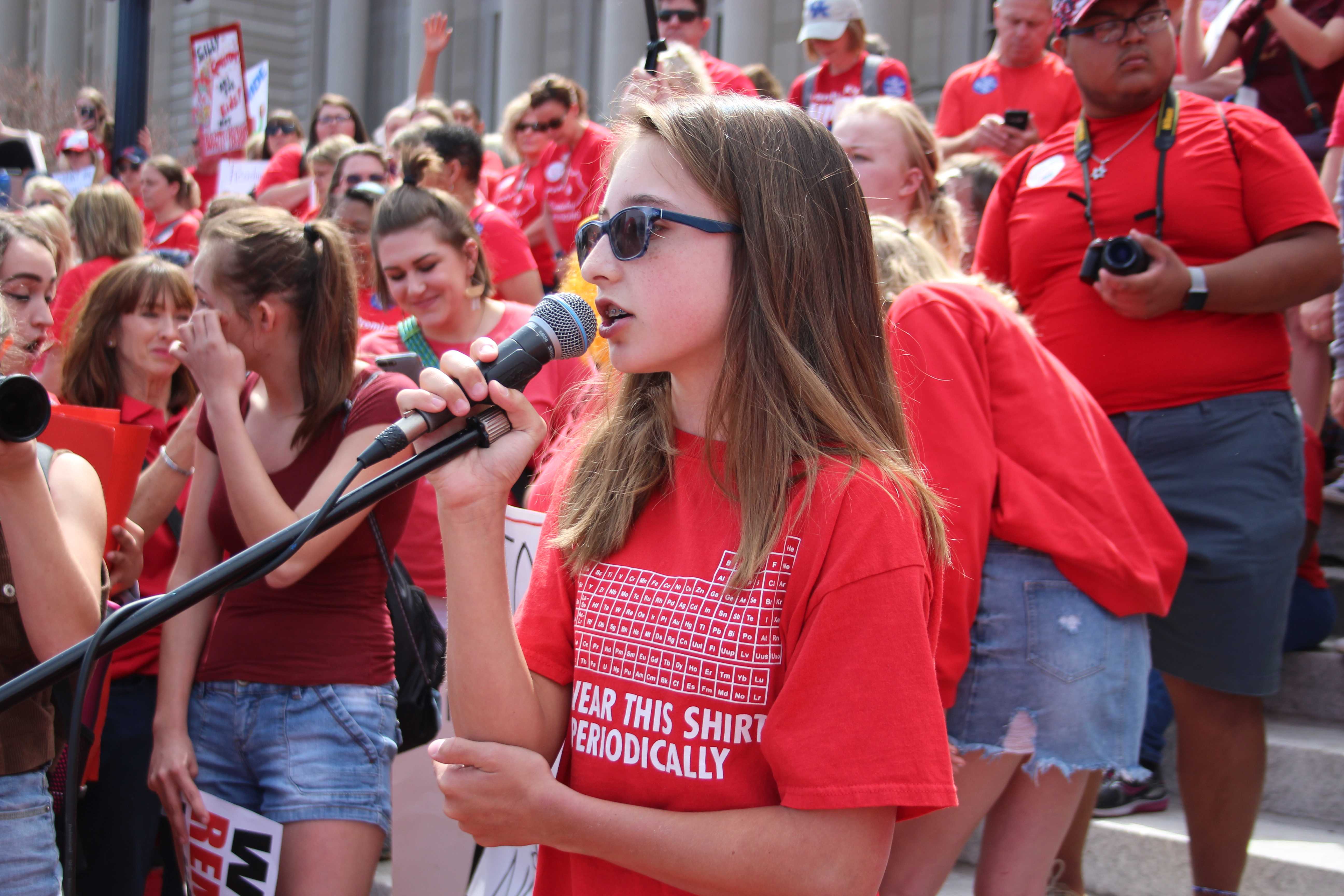 A 7th grader from Meyzeek Middle School speaking to the crowd. Photo by Jade Broderick.