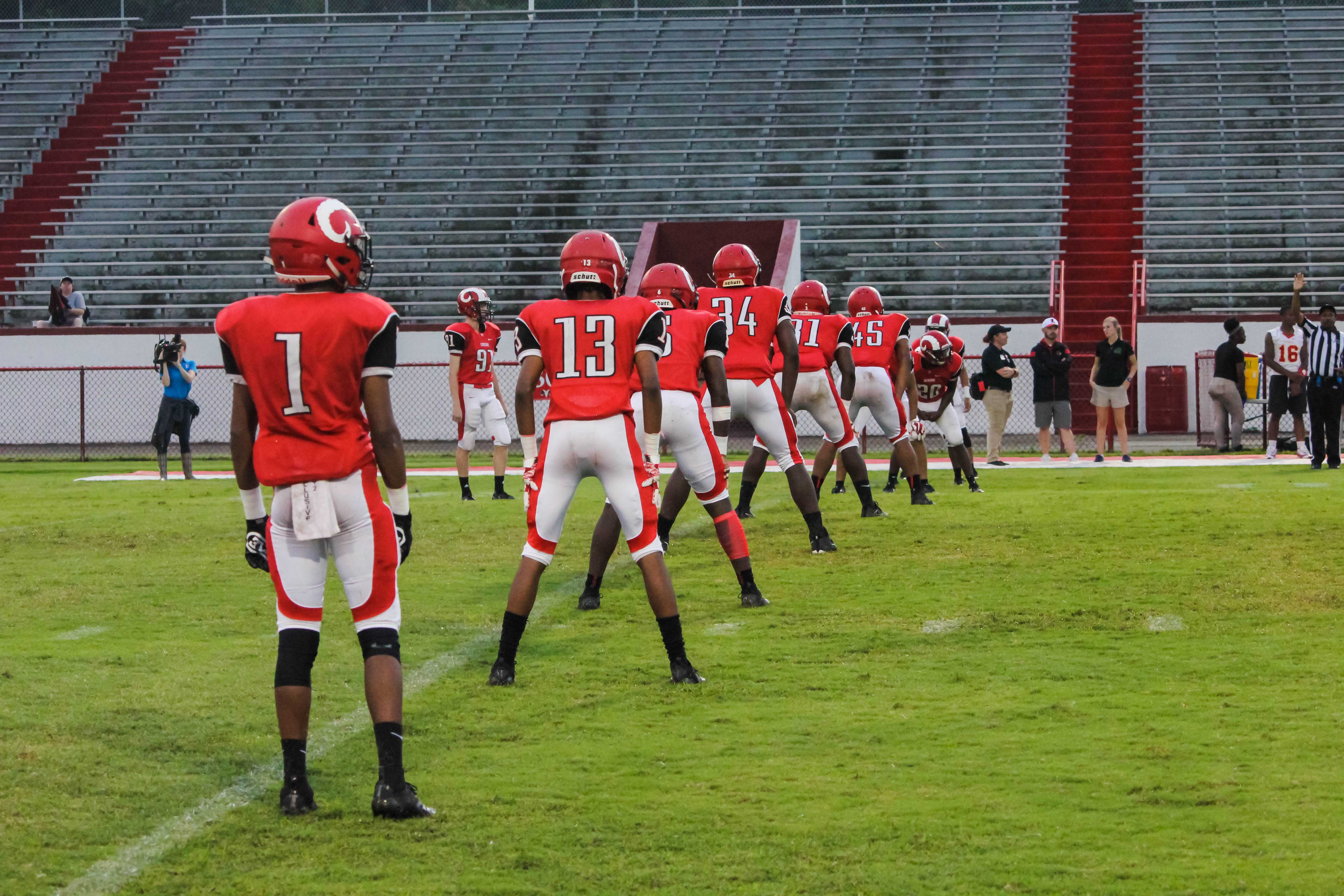 Crimsons line up for the opening kickoff as the game begins. Photo by EP Presnell.