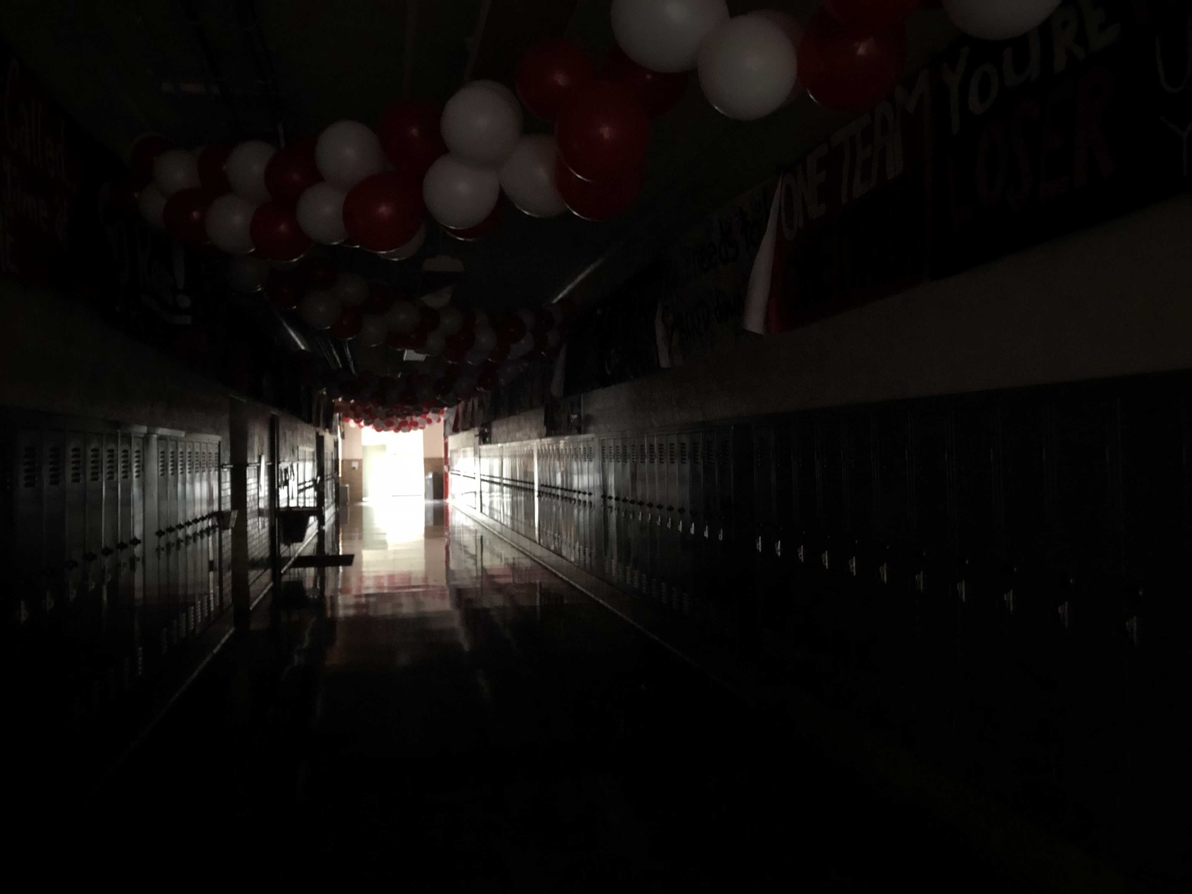 Even some emergency backup lights werent working when Manual lost power, leaving several hallways completely dark. Photo by Reece Gunther.