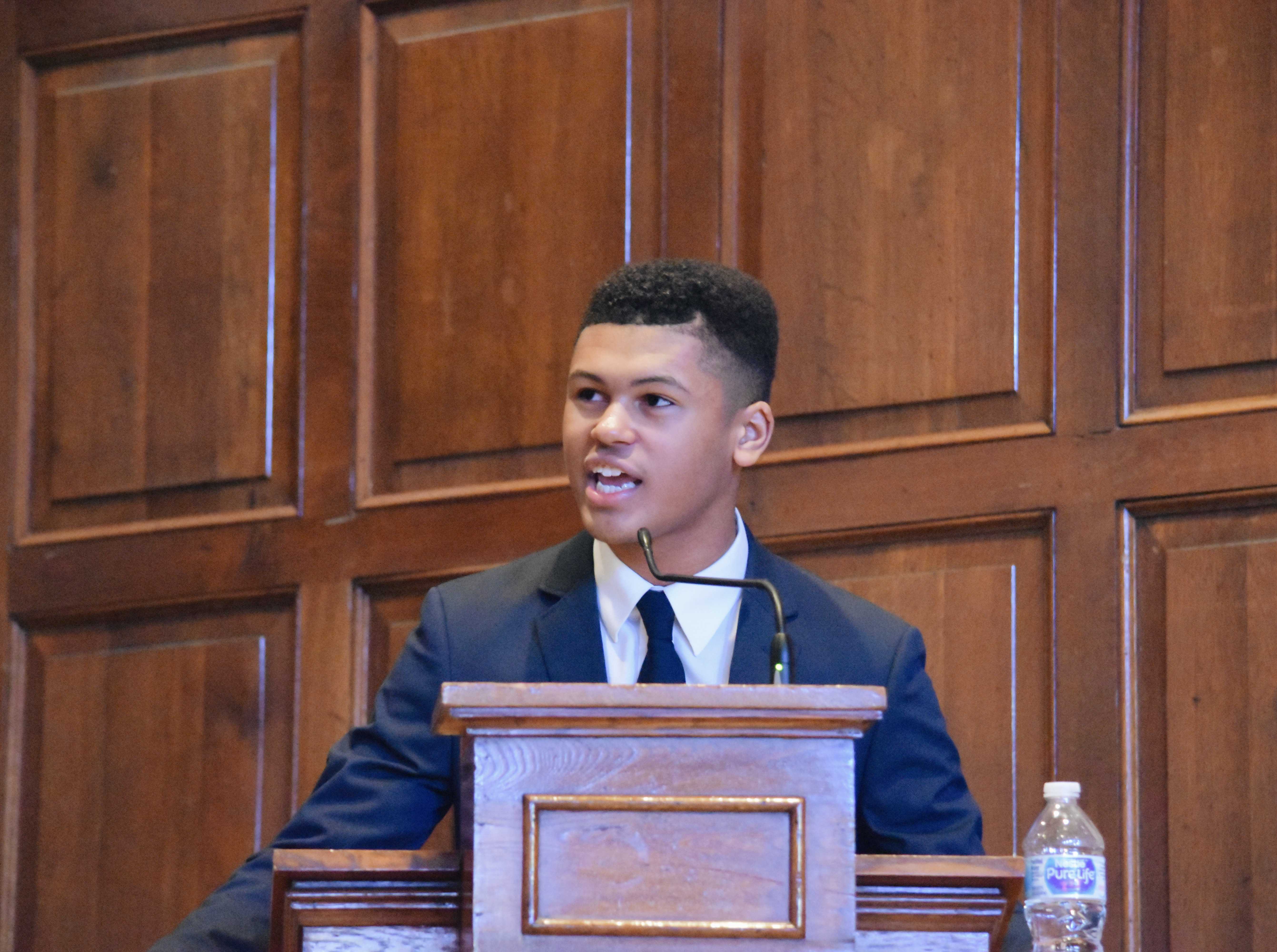 Sean Waddell (12, HSU) presented his original poem To Liberation that he hopes puts Black History Month into perspective. [Black people have] contributed greatly to human kind, involuntarily and voluntarily. The least people can do is pay respect and honor, Waddell said. Photo by Piper Hansen.