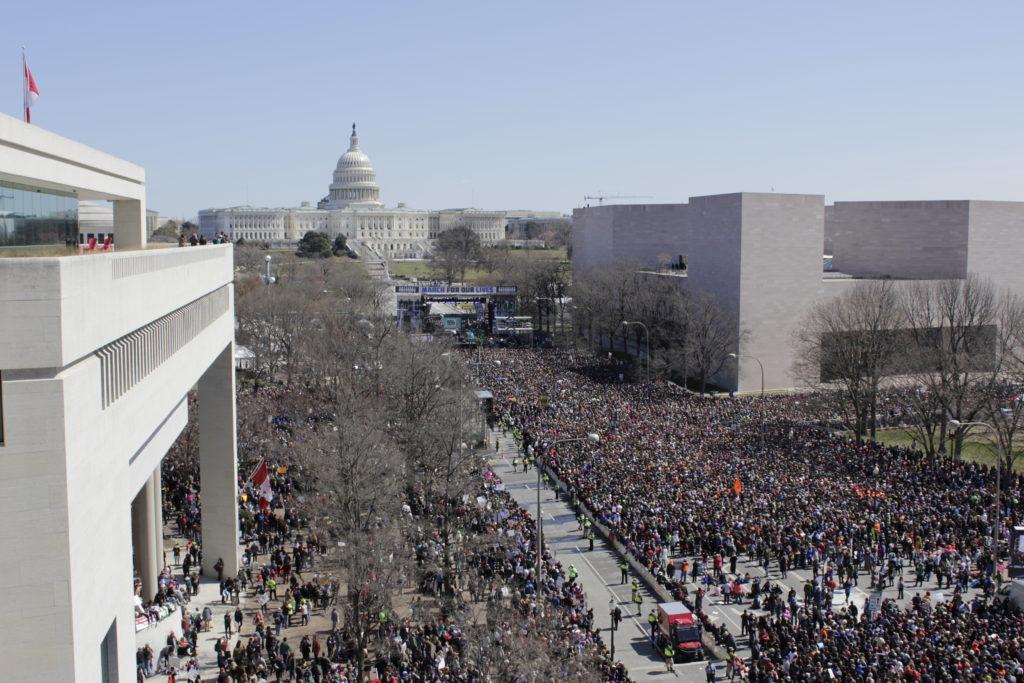 On top of the Newseum, spectators could see up and down Pennsylvania Avenue as hundreds of thousands gathered for the March for Our Lives. Photo by Nyah Mattison.