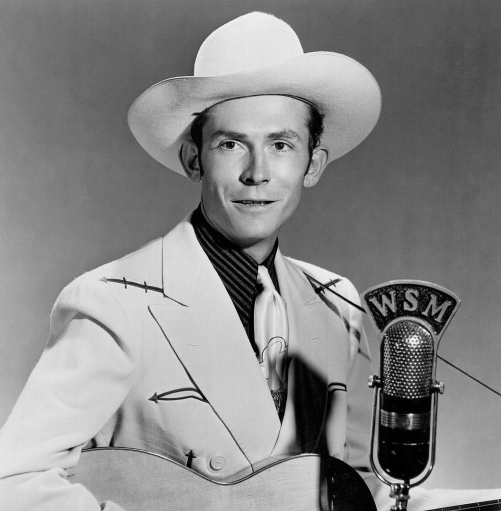 Featured Image Citation: Hank Williams Promotional Photo by WSM Radio is public domain on Wikimedia Commons. No changes were made to the original image. Use of this image does not indicate photographer endorsement of the article.