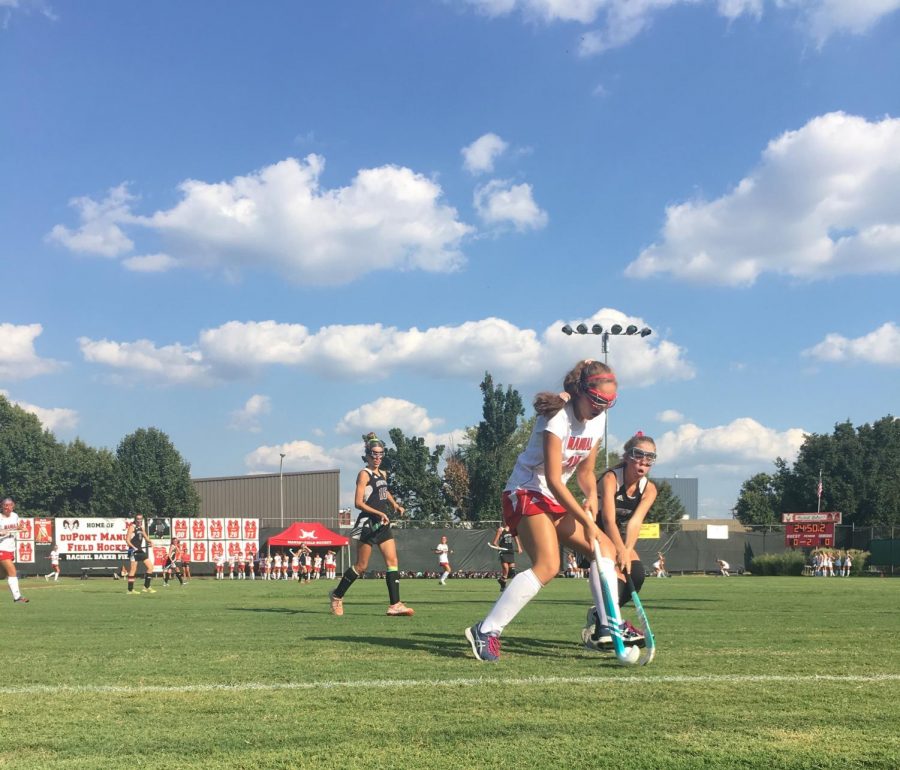Manual and Assumption freshman field hockey players go head to head in their game. Photo by Ella Dye.