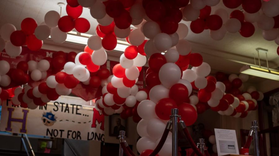 In center hall, the balloons come to hang down in the roped area at the front of the school. Photo by Cesca Campisano