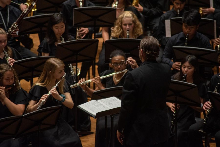 Mr. Jason Gregory acts as the conductor to the YPAS band as they perform in the Prism Concert. Photo by Cesca Campisano