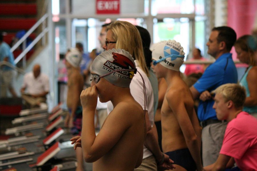 A+Cardinal+Aquatics+swimmer+prepares+for+a+race+at+U+of+L.+Photo+by+Kate+Benton.