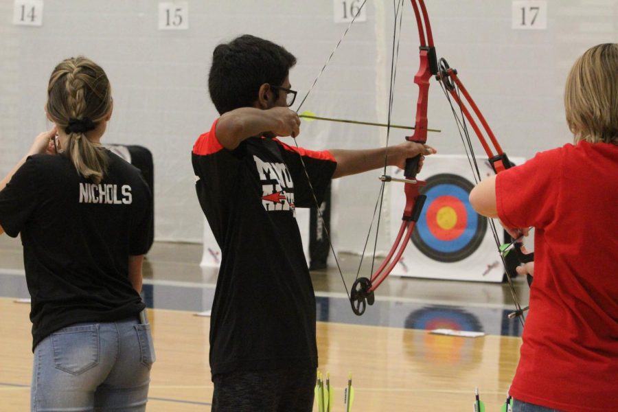 Manuals archery team competes against Eastern. Photo by Satchel Walton. 