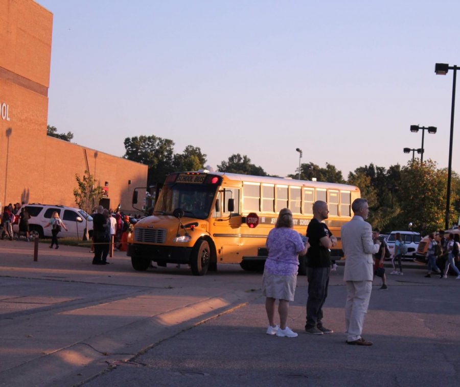 On Aug. 15 2019, administrators watch buses arrive to school in the morning. JCPSs busing policy, implemented in the school year of 1975-1976, provides busing for any students living more than a mile away from their school. This practice attempted to desegregate the city.