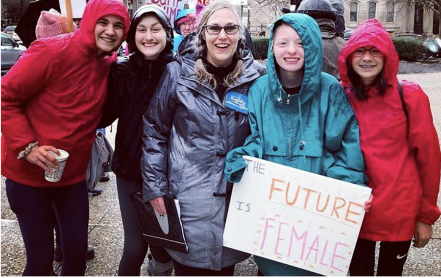 Suzanne Kugler and some students at the Women's March in Louisville. Photo Courtesy by Suzanne Kugler