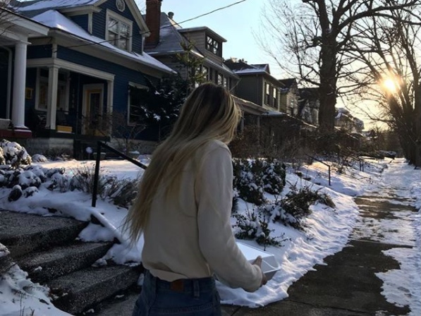 Olivia Brotzge (11, J&C) spends time with a new friend in the cold temperatures. Photo courtesy of @drizzy.liv via Instagram.