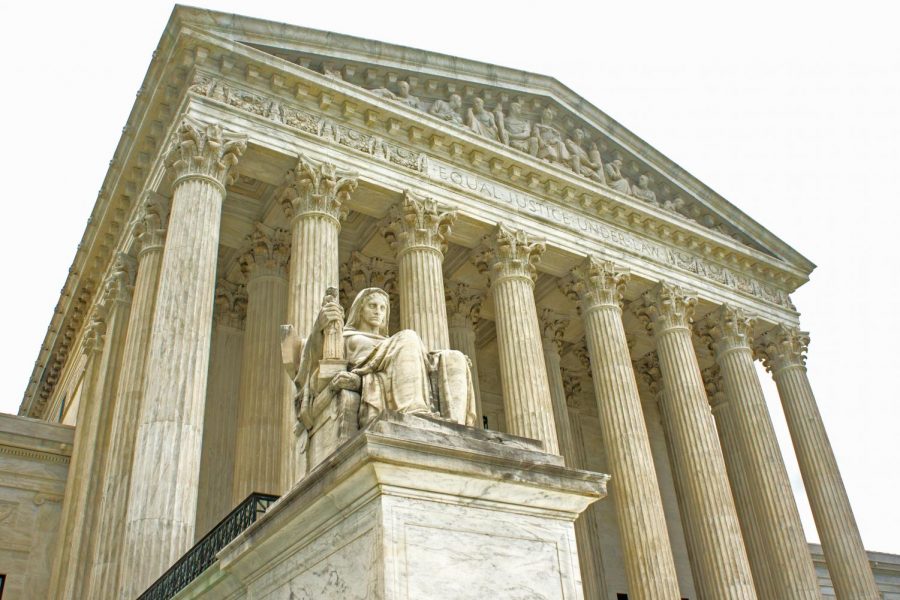 Photo of the Supreme Court building showing the Contemplation of Justice.