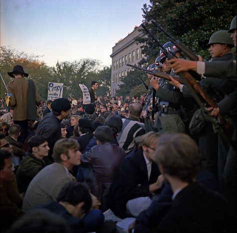 National guardsmen and protestors face off in Washington DC during 1967 Vietnam war protests.