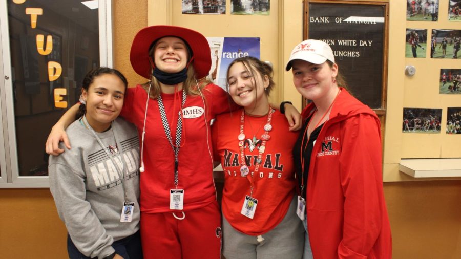 Students pose in the senior cafeteria showing off their school spirit. Photo by Ofelia Mattingly.