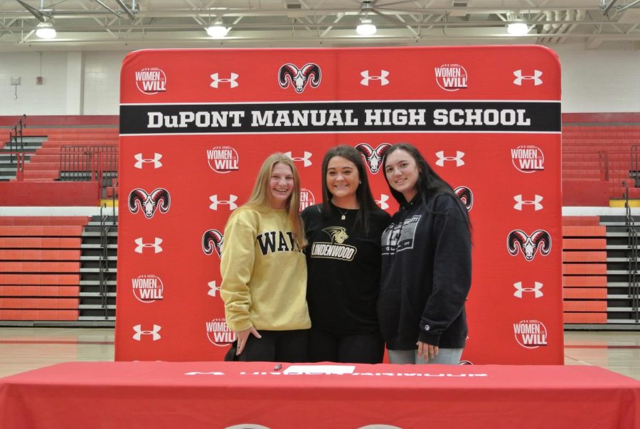 (From left to right) Amelia Frey (12, J&C), Emma Hulsmeyer (12, HSU) and Jewell Fentress (12, HSU) all signed to play at the next level yesterday. Frey and Hulsmeyer will be playing field hockey and Fentress will be playing softball. Photo by Macy Waddle.