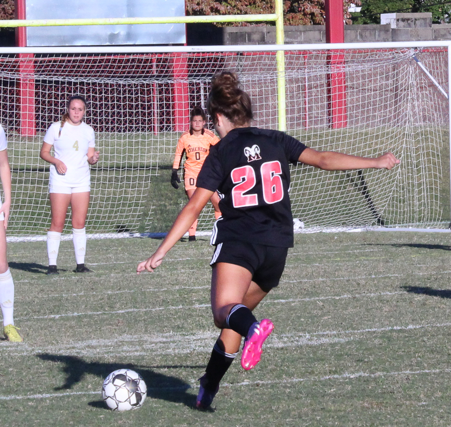 Freshman Isabelle Hooper shoots toward the goal