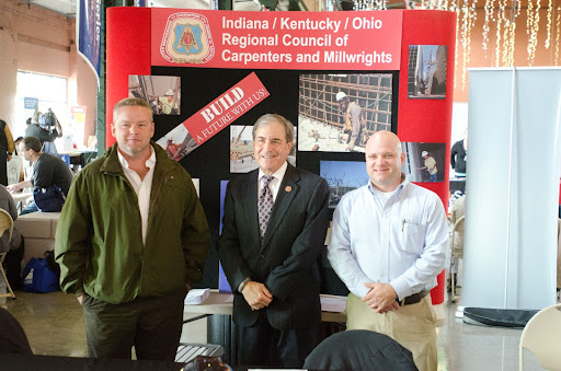 John Yarmuth meeting with local businesses at a job fair in 2013. Photo courtesy of the  Kentucky National Guard Public Affairs Office.