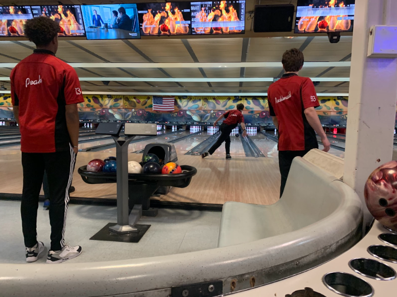 The boys’ bowling team playing one of their last regular season matches against Central. Photo by Katie Dikes