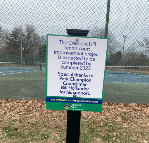 A sign posted outside the tennis courts announces the renovation plan. Photo by Katie Dikes
