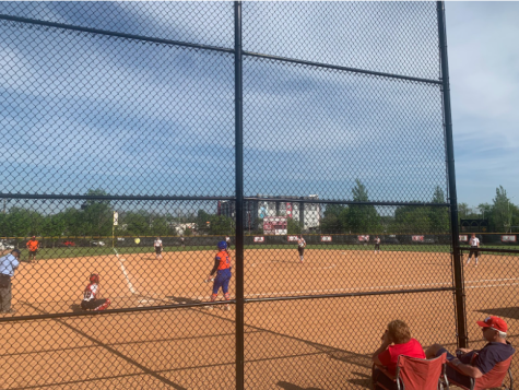 The Manual varsity softball team’s defense covers the field during a game. Photo by Katie Dikes