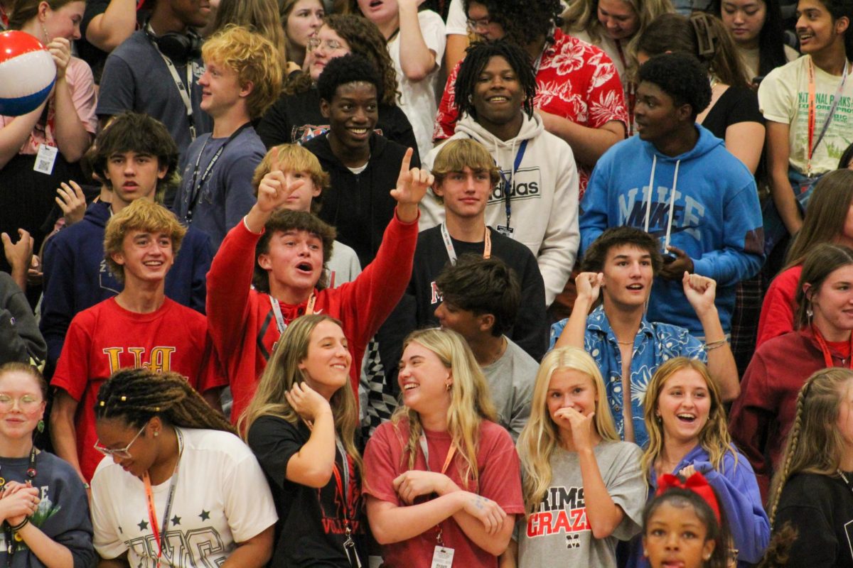 The junior class cheering at the pep rally.