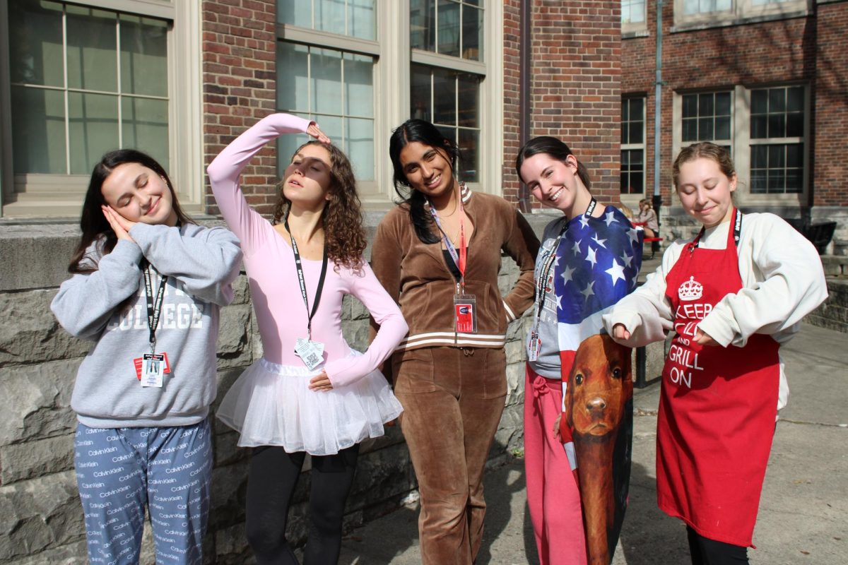 Victoria Blinetsky (12, HSU), Lauren Curry (12, HSU), Raima Dutt (12, MST), Kate Bell (12, HSU) and Alexis Blinetsky (12, HSU) in their group rhyming costumes. Photo by Ava Blair.