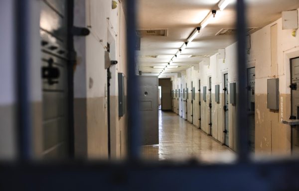 Image of a correctional facility hallway.