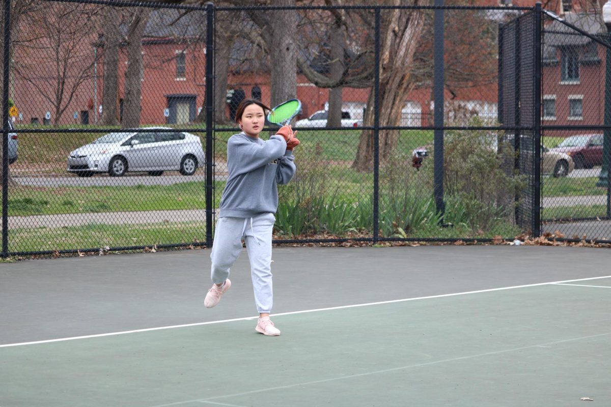 Alice Kwon (10, MST) hitting a successful serve during her warm up. Photo by Mayrin Romero Hernandez