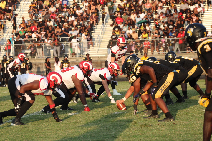 The Crimsons' defense lines up against Central on Friday Aug.23.