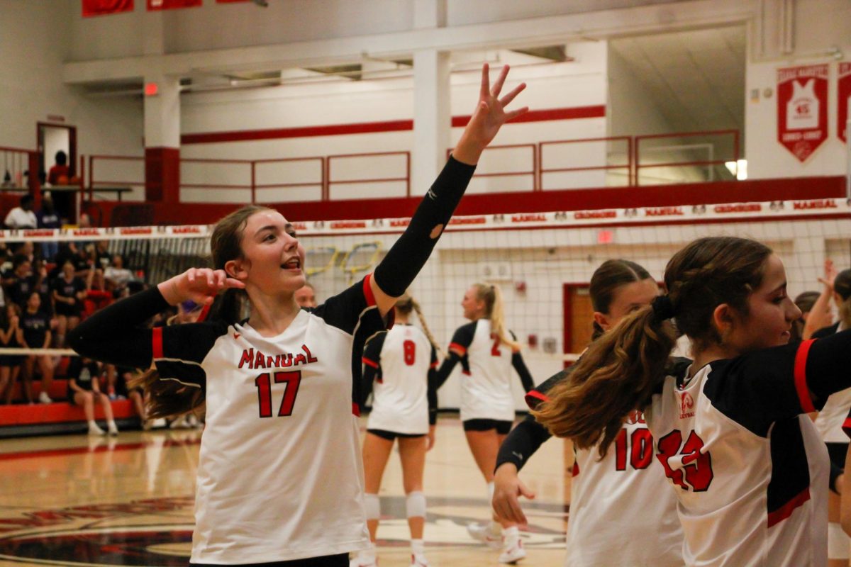 The girls' varsity volleyball team defeated Male in the annual rivalry game.