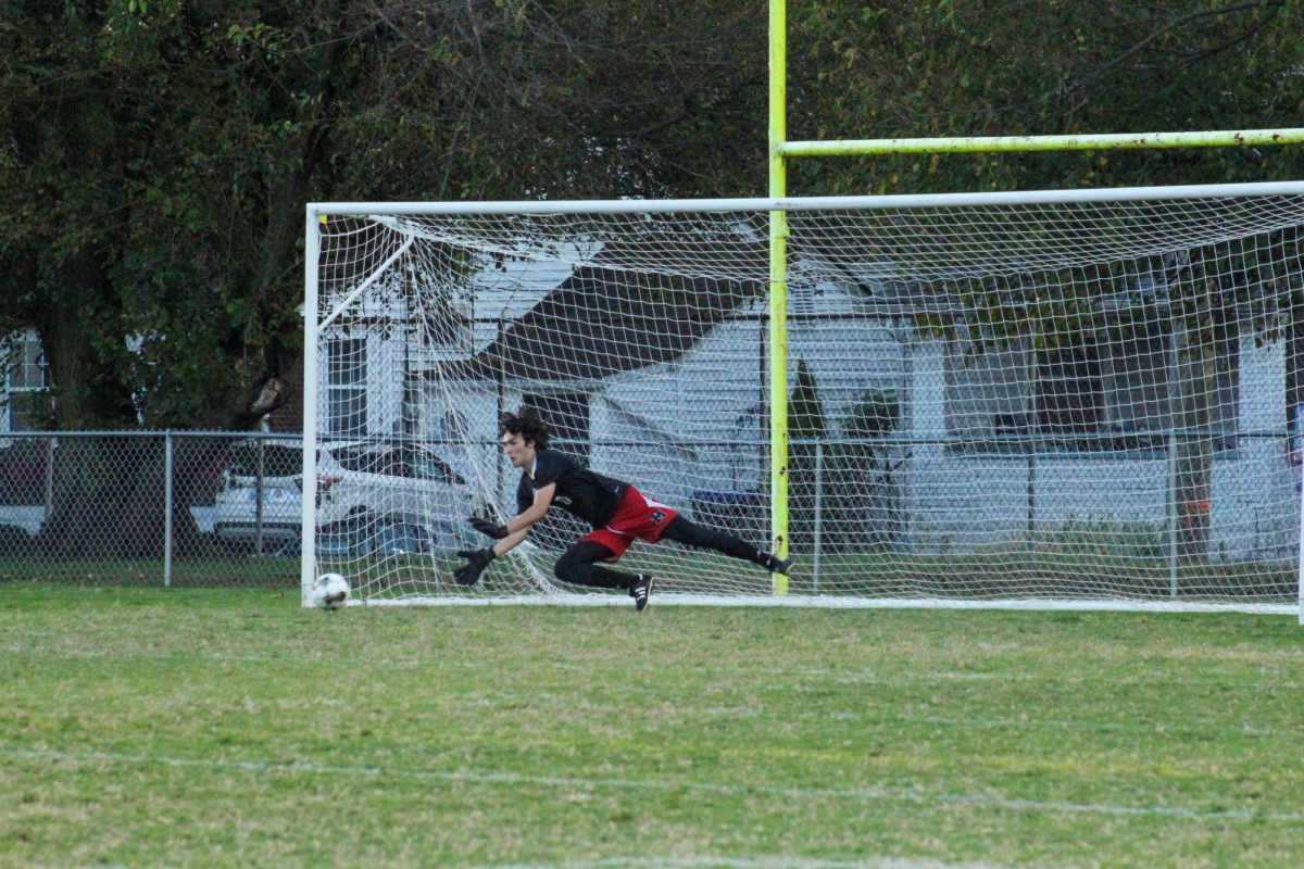 Gavin Fulton (#0, 12) saving Brown's penalty kick.