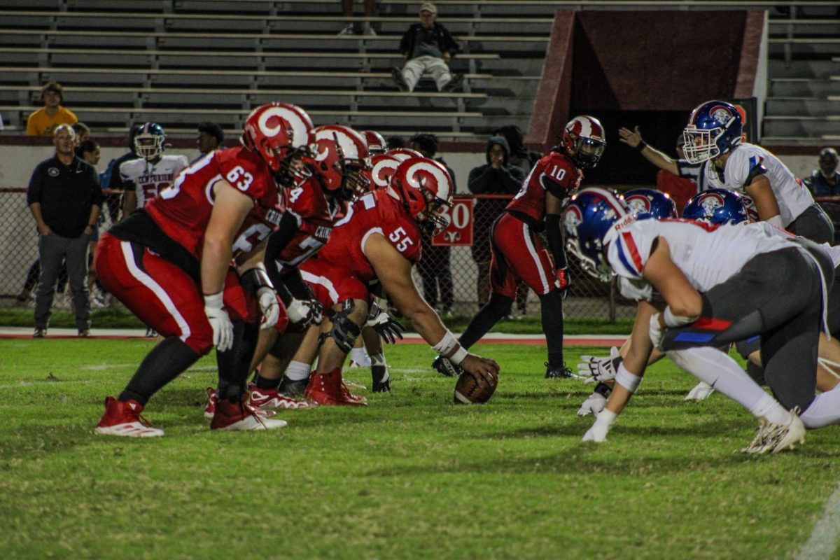 Manual's offense and Christian Academy defense lines up for the snap.