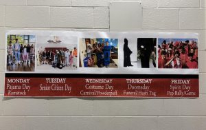 Banners in the hallways inform students of the upcoming Red/White Week themes and events.