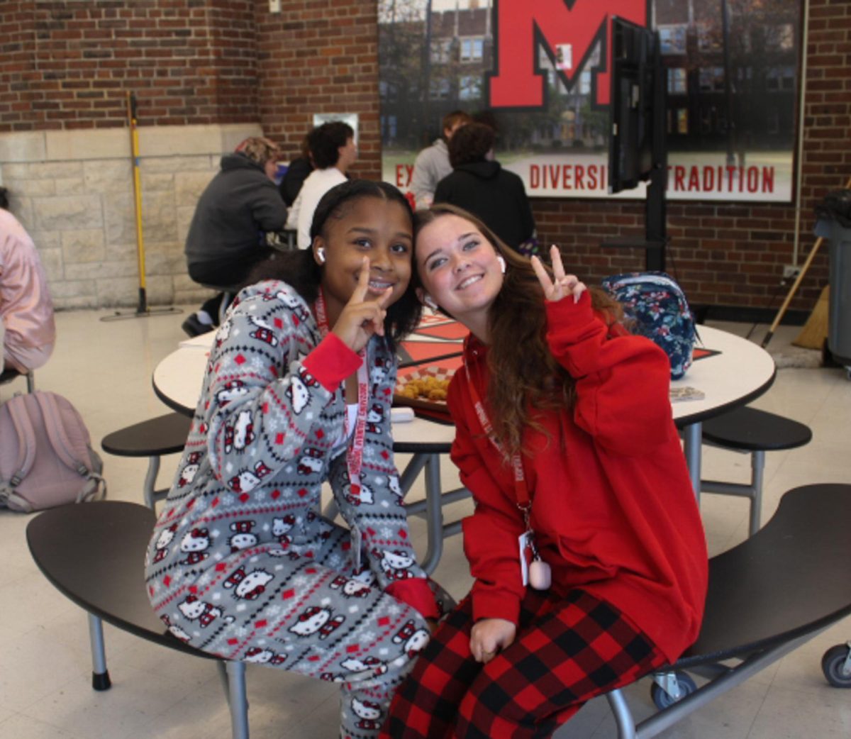 Samiya Taylor (J&C, 10) and Molly Haber (VA, 10) sits together at lunch in their pajamas